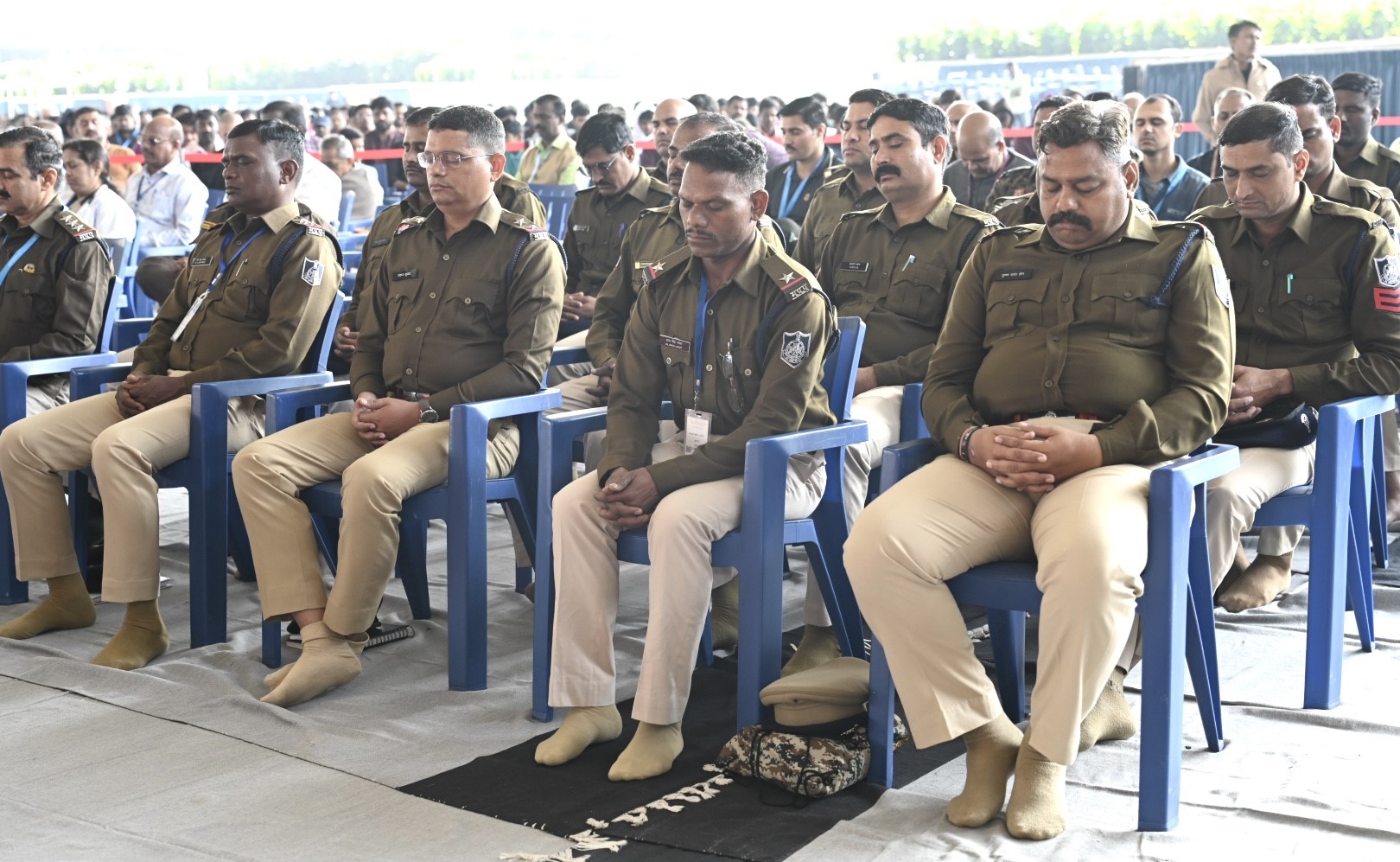 Police officials practicing Heartfulness meditation as part of the ‘One World, One Heart’ event