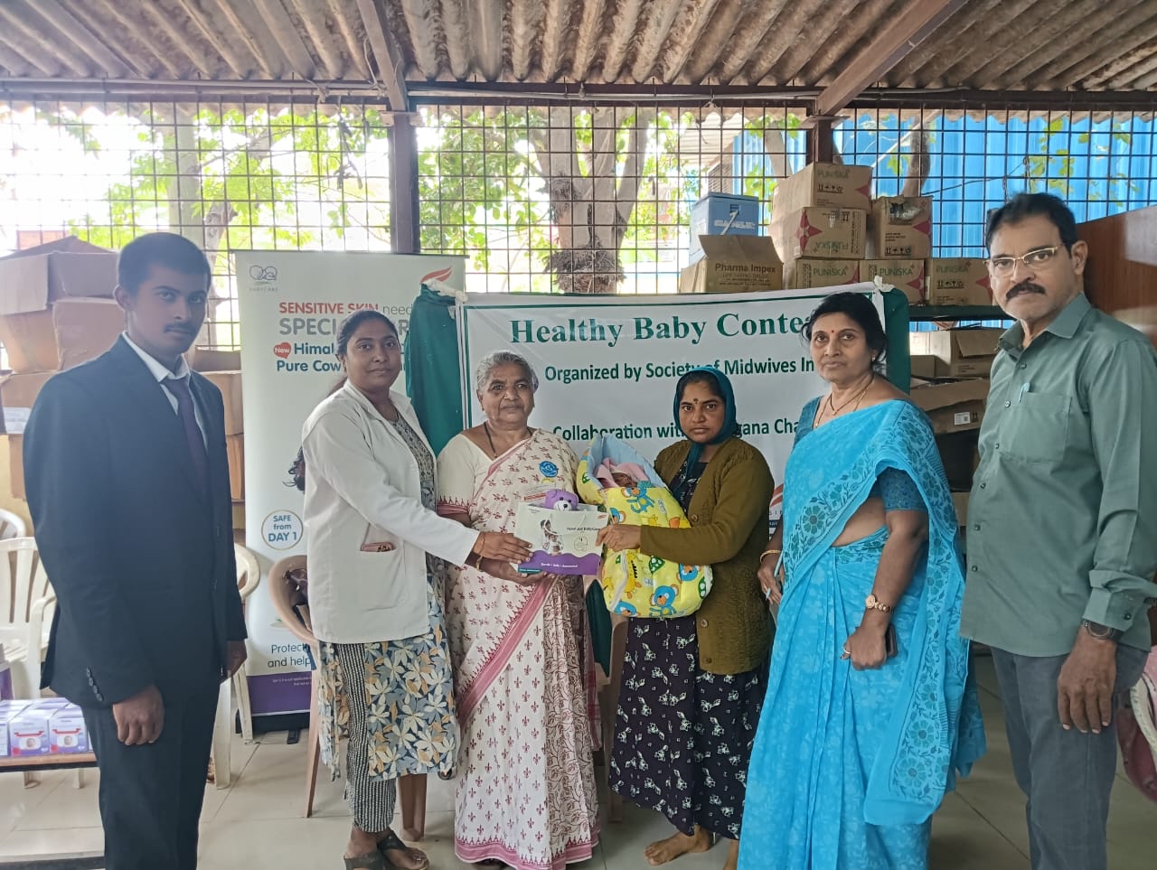 Hyderabad, December 12, 2025: Himalaya BabyCare, India’s leading baby care brand loved by babies, in collaboration with the Society of Midwives of India (SOMI), conducted a Healthy Baby Contest at the Primary Health Center (PHC), Narapally, Medchal District, Hyderabad. The initiative brought together mothers, babies, healthcare professionals, and community caregivers to raise awareness about overall child growth, maternal well-being, and early developmental care.
The activity witnessed enthusiastic participation from 65+ mothers and their babies, along with 20 antenatal (ANC) mothers, supported by pediatricians and the PHC team, including medical officer Dr. Shobana Bhandari. The atmosphere was vibrant and attentive, reflecting strong community interest in child health and early developmental care. During the contest, pediatricians evaluated each baby based on key health and developmental parameters including motor skills, height, weight, and activity levels.
Himalaya BabyCare has successfully organized 1,500+ Healthy Baby Contests so far and aims to conduct over 2,000 contests across India in the next one year, reinforcing its commitment to promoting child wellness at the grassroots level.
Himalaya BabyCare and SOMI collaboratively announced the winners of the Healthy Baby Contest: Samanveya – First Place, Niyanshika– Second Place, Karthikeya– Third Place. All the winners received an exclusive Himalaya Baby Gift Pack, and all participants were given a goody bag containing a participation certificate, a teddy bear, and a Himalaya BabyCare sample pack.
In addition to assessments organized by SOMI and the PHC healthcare professionals, mothers received guidance on infant nutrition, hygiene, immunization, breastfeeding, and postnatal care. The initiative aimed to reinforce the importance of early and proper care for newborns and babies and encourage families to adopt healthy childcare practices.
Speaking about the initiative, Mr. Chakravarthi N.V., Director – BabyCare, Himalaya Wellness Company, said, “At Himalaya BabyCare, we believe that every baby deserves a healthy start, and we’re committed to stand by mothers as their trusted partner throughout their baby care journey. Our collaboration with SOMI reflects our shared purpose of supporting parents with knowledge, care, and accessible resources on childcare. Through initiatives like the Healthy Baby Contest, we intend to empower parents at the grassroots by creating awareness of growth and developmental milestones and promoting healthy baby care practices during their child’s earliest and most formative years.”
The Healthy Baby Contest is part of Himalaya BabyCare’s ongoing efforts to champion the well-being of babies and mothers across communities and help families nurture their little ones with care and confidence from DAY 1.